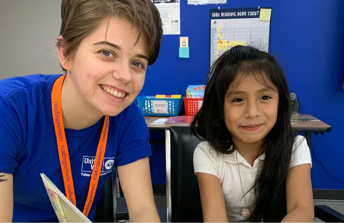a student-tutor pair during a literacy lesson