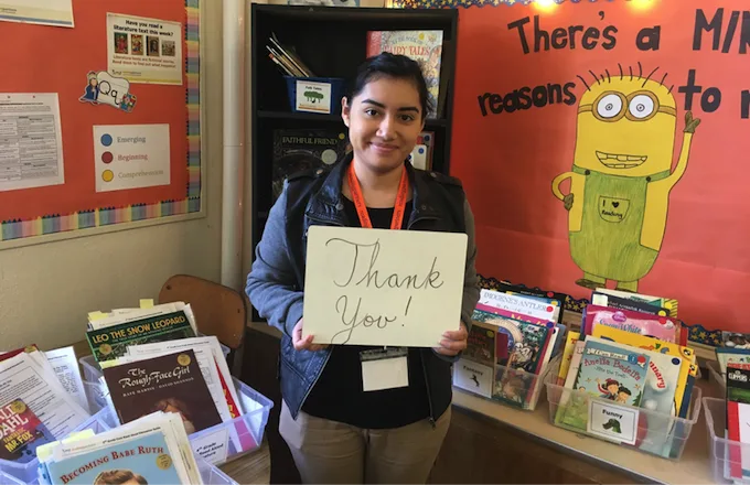 tutor with a whiteboard reading 