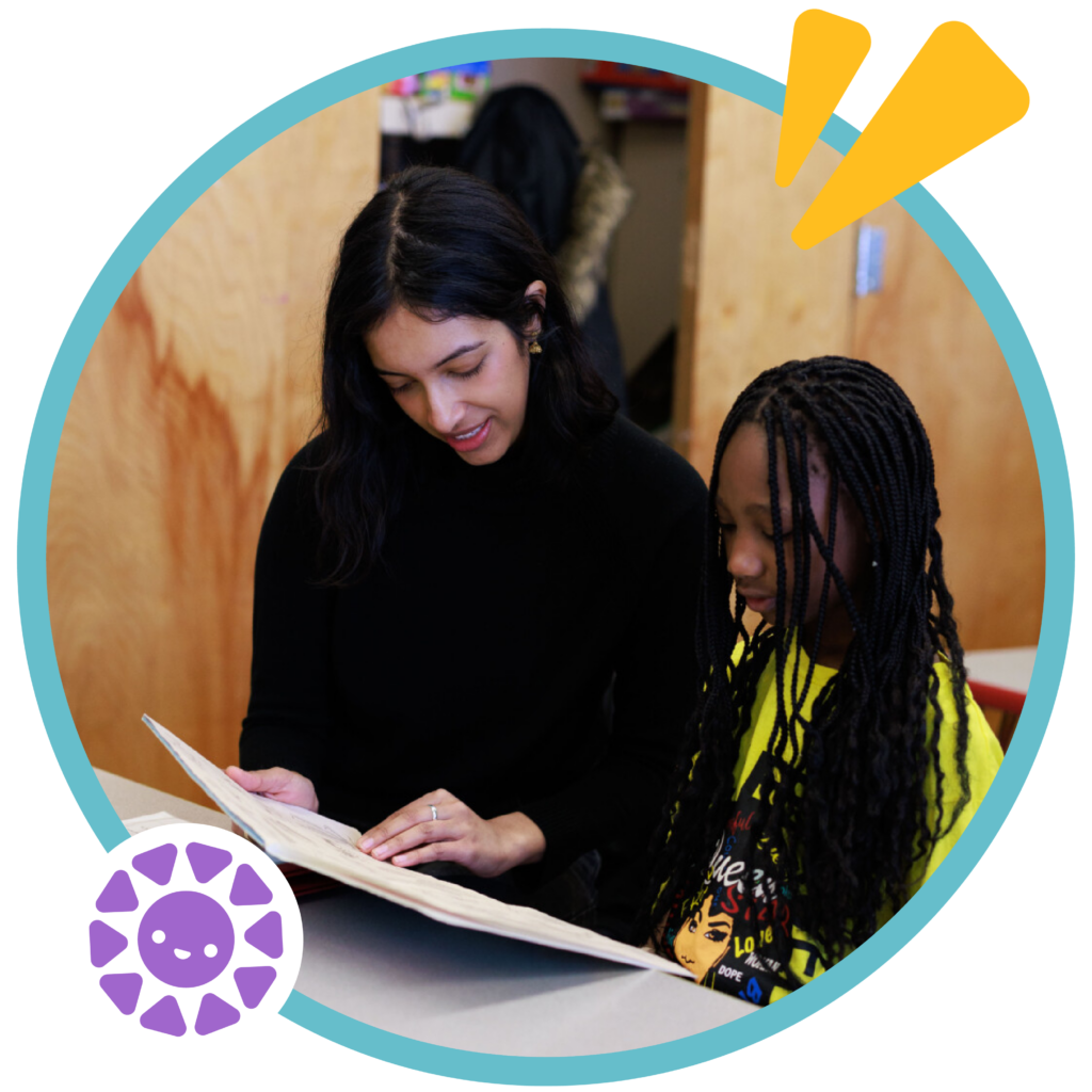 student-tutor pair during a literacy lesson