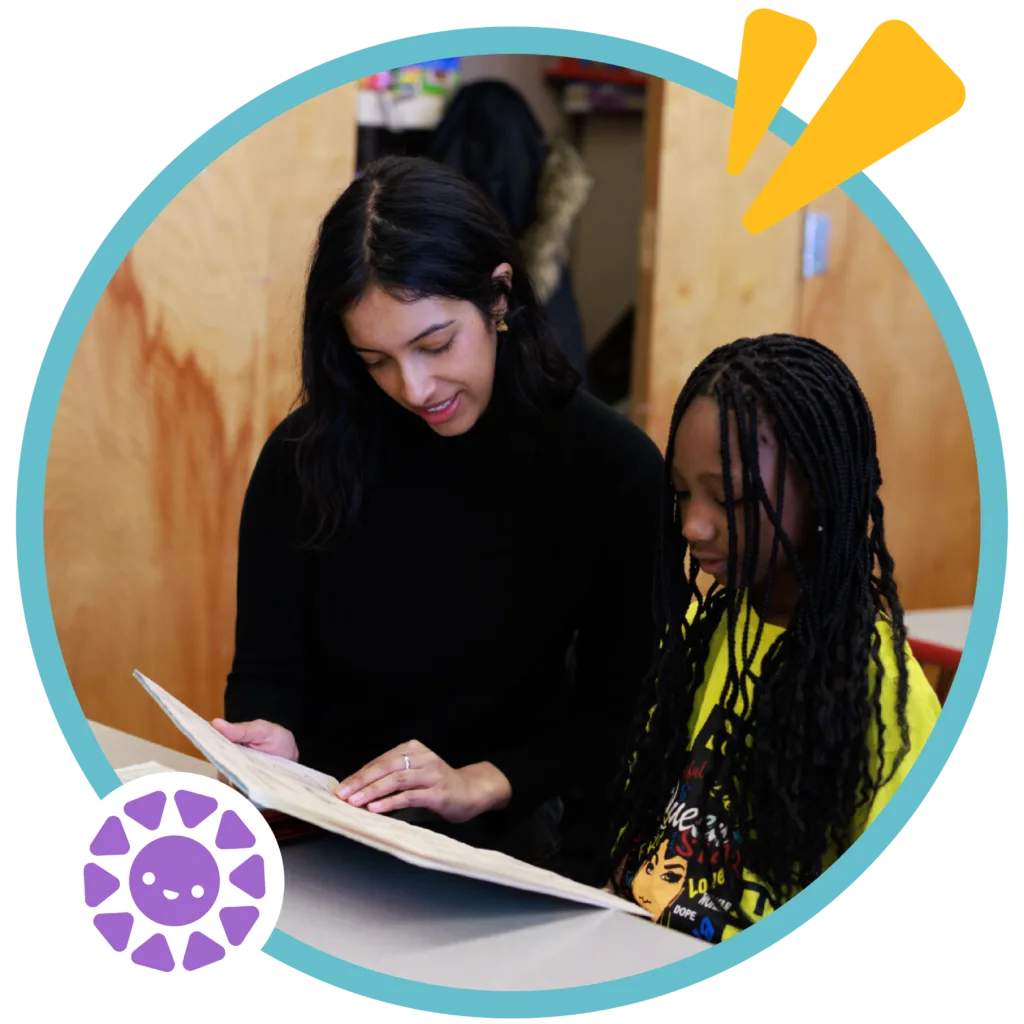 student-tutor pair during a literacy lesson