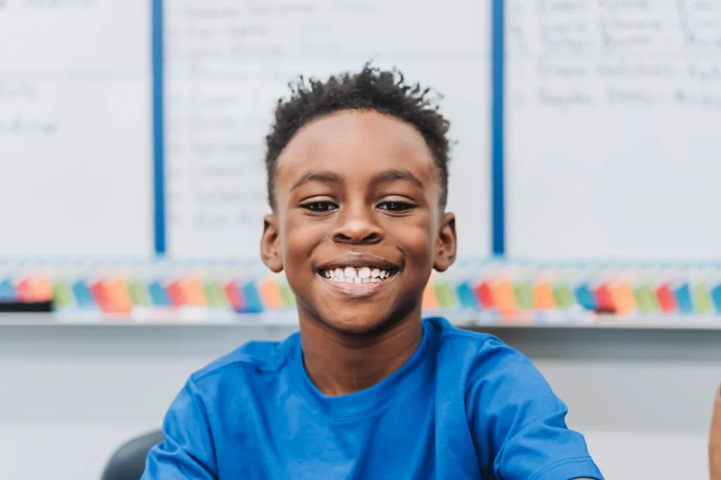 student smiling at camera