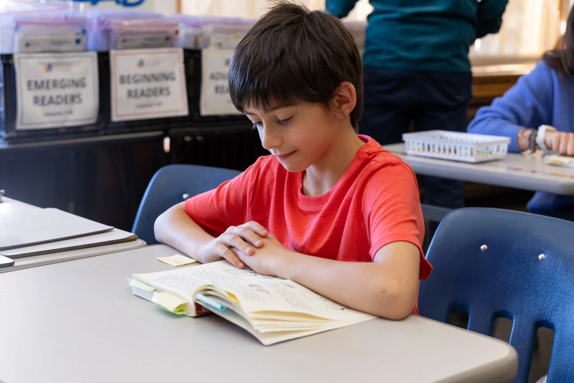 a student reading a book; neurodiversity